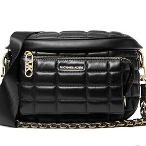 Brand new Michael Kors Sling Pack. Black & Gold
